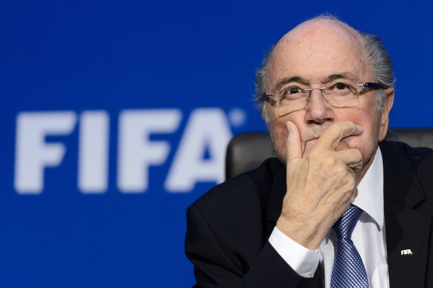 FIFA president Sepp Blatter gestures during a press conference at the football's world body headquarter's on July 20, 2015 in Zurich. FIFA said today that a special election will be held on February 26 to replace president Sepp Blatter. AFP PHOTO / FABRICE COFFRINI        (Photo credit should read FABRICE COFFRINI/AFP/Getty Images)