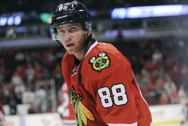 Chicago Blackhawks right wing Patrick Kane (88) warms up before a pre-season NHL hockey game against the Detroit Red Wings in Chicago, Tuesday, Sept. 22, 2015.  (AP Photo/David Banks)