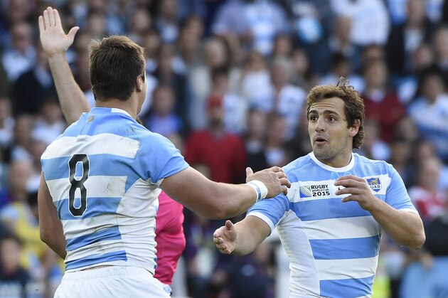 Argentina's fly half Nicolas Sanchez (R) celebrates  scoring a drop goal with Argentina's number 8 Facundo Isa  during a Pool C match of the 2015 Rugby World Cup between Argentina and Georgia at Kingsholm stadium in Gloucester, west England, on September 25, 2015.  AFP PHOTO / LOIC VENANCE

RESTRICTED TO EDITORIAL USE, NO USE IN LIVE MATCH TRACKING SERVICES, TO BE USED AS NON-SEQUENTIAL STILLS        (Photo credit should read LOIC VENANCE/AFP/Getty Images)