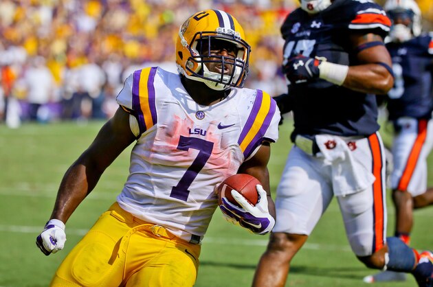 Sep 19, 2015; Baton Rouge, LA, USA; LSU Tigers running back Leonard Fournette (7) celebrates as he runs for a touchdown against the Auburn Tigers during the second quarter of a game at Tiger Stadium. Mandatory Credit: Derick E. Hingle-USA TODAY Sports