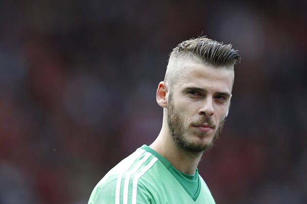Manchester United goalkeeper David De Gea arrives for the English Premier League soccer match between Manchester United and Liverpool at Old Trafford Stadium, Manchester, England, Saturday, Sept. 12, 2015. (AP Photo/Jon Super)