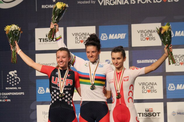 USA cyclist and gold medalist Chloe Dygert, center, USA's Emma White, left, silver medalist and bronze medalist Agnieszka Skalniak, of Poland, celebrate following the Women's Junior Road Circuit cycling race at the UCI Road World Championships in Richmond, Va., Friday, Sept. 25, 2015. (AP Photo/Skip Rowland)