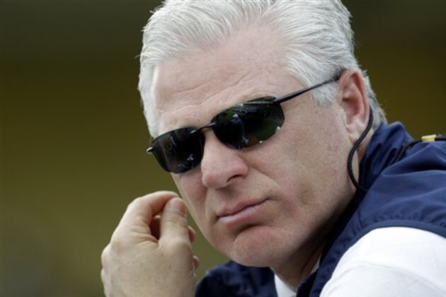 FILE - This Feb. 23, 2010 file photo shows Atlanta Braves general manager Frank Wren during spring training baseball practice, in Kissimmee, Fla. There has been no flashy free agent signing, no blockbuster trade this offseason for the Braves. Wren says the quiet winter is proof of his confidence in the Braves' talent. (AP Photo/Rob Carr, File)