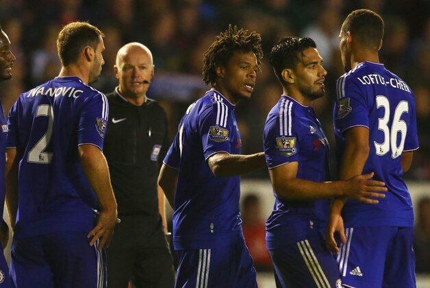 WALSALL, ENGLAND - SEPTEMBER 23:  Loic Remy of Chelsea (3R) celebrates with team mates as he scores their second goal during the Capital One Cup third round match between Walsall and Chelsea at Banks's Stadium on September 23, 2015 in Walsall, England.  (Photo by Matthew Lewis/Getty Images)