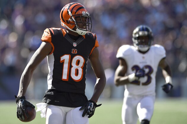 BALTIMORE, MD - SEPTEMBER 07: Wide receiver A.J. Green #18 of the Cincinnati Bengals rushes after making a catch to score in the fourth quarter against the Baltimore Ravens at M&T Bank Stadium on September 7, 2014 in Baltimore, Maryland. (Photo by Patrick Smith/Getty Images)
