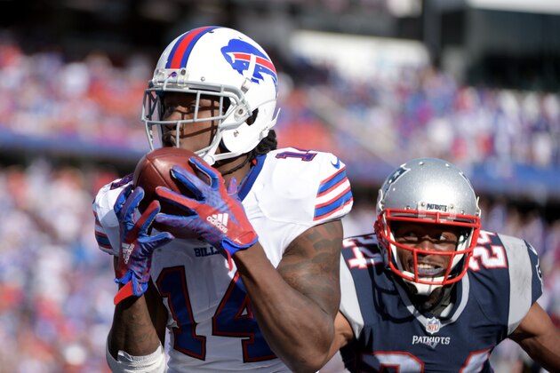 Buffalo Bills wide receiver Sammy Watkins (14) scores on a touchdown pass as he gets by New England Patriots cornerback Larry Fletcher (24) during the second half of an NFL football game Sunday, Sept. 20, 2015, in Orchard Park, N.Y. New England won 40-32. (AP Photo/Gary Wiepert)