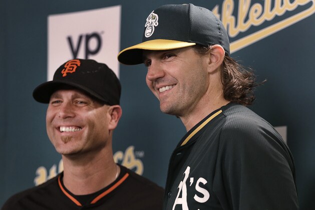 San Francisco Giants pitcher Tim Hudson, left, and Oakland Athletics pitcher Barry Zito smile after a news conference prior to a baseball game Friday, Sept. 25, 2015, in Oakland, Calif. (AP Photo/Ben Margot)