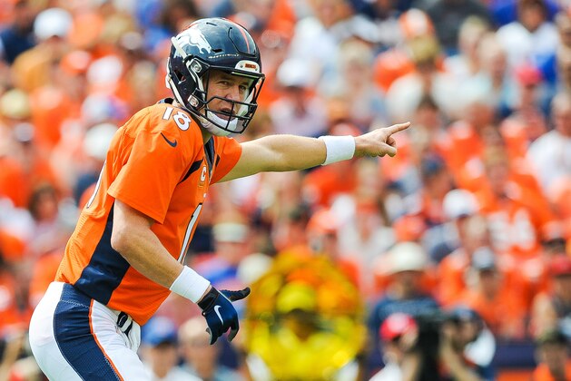 DENVER, CO - SEPTEMBER 13:  Quarterback Peyton Manning #18 of the Denver Broncos calls out the coverage  in the first quarter of a game against the Baltimore Ravens at Sports Authority Field at Mile High on September 13, 2015 in Denver, Colorado.  (Photo by Dustin Bradford/Getty Images)