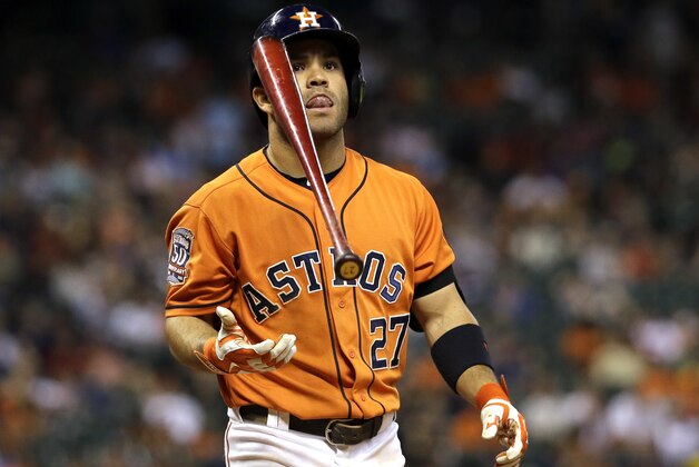 Houston Astros' Jose Altuve flips his bat after striking out against the Arizona Diamondbacks during the 10th inning of a baseball game, Friday, July 31, 2015, in Houston. The Diamondbacks won 6-4 in 10 innings. (AP Photo/David J. Phillip)