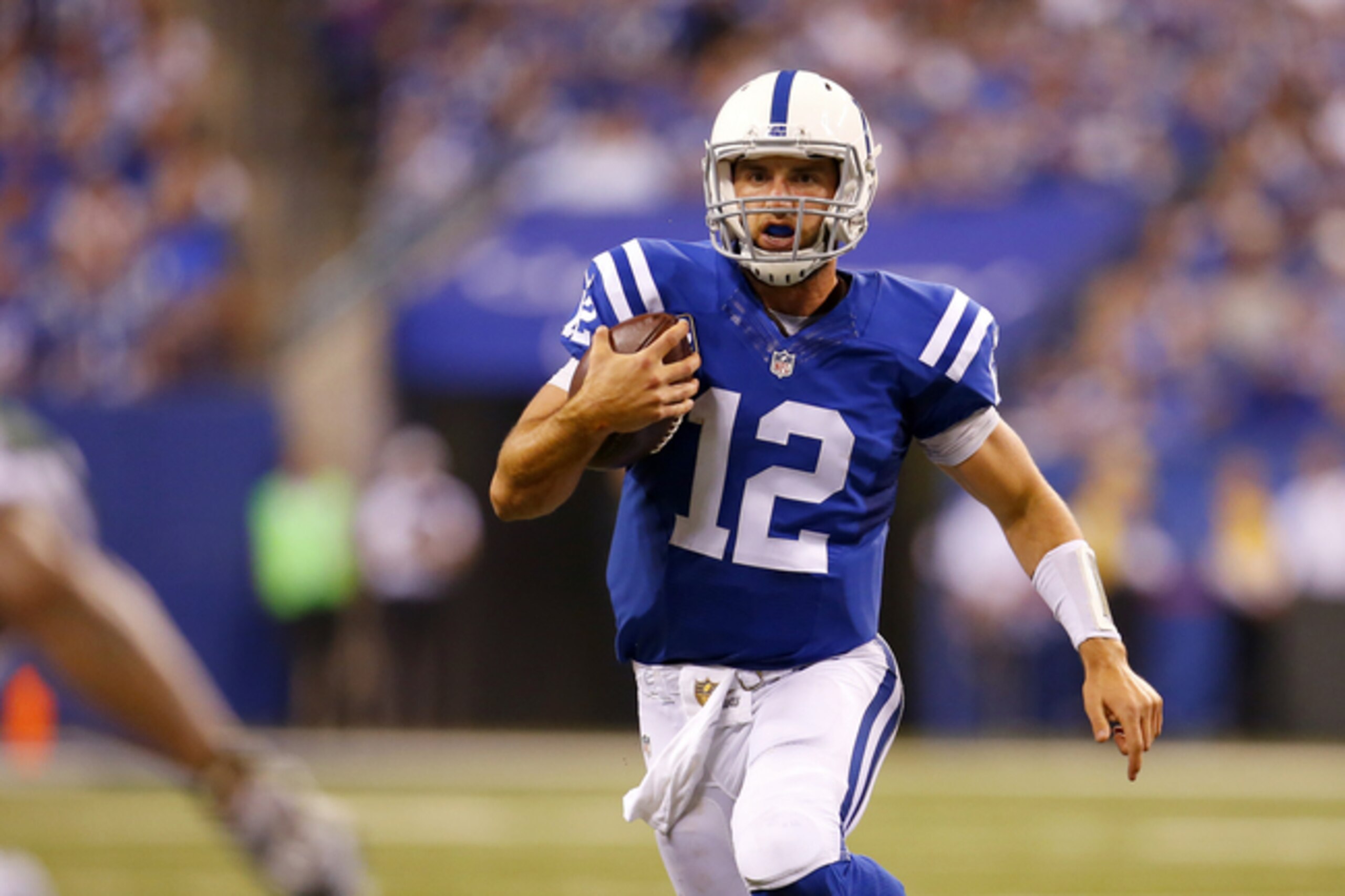 Indianapolis Colts quarterback Andrew Luck (12) runs with the ball against the New York Jets during an NFL football game in Indianapolis, Monday, Sept. 21, 2015. (Jeff Haynes/AP Images for Panini)
