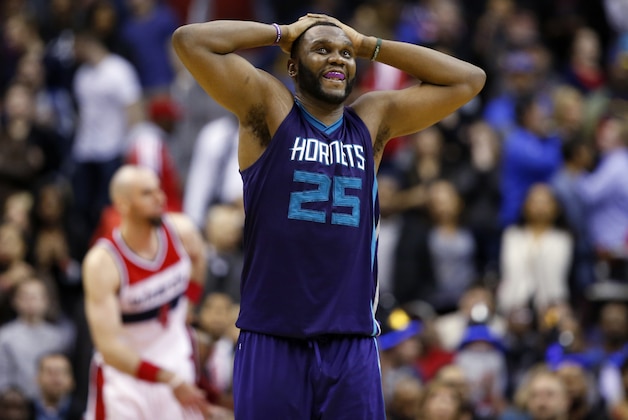 Charlotte Hornets center Al Jefferson (25) reacts after the first overtime of the Hornets' NBA basketball game against the Washington Wizards, Friday, March 27, 2015, in Washington. The Wizards won 110-107 in double overtime. (AP Photo/Alex Brandon)