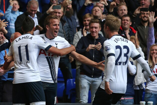 Tottenham Hotspur's English striker Harry Kane (2nd L) celebrates with Tottenham Hotspur's Argentinian midfielder Erik Lamela and Tottenham Hotspur's Danish midfielder Christian Eriksen (R) after scoring their third goal during the English Premier League football match between Tottenham Hotspur and Manchester City at White Hart Lane in north London on September 26, 2015. AFP PHOTO / JUSTIN TALLIS

RESTRICTED TO EDITORIAL USE. No use with unauthorized audio, video, data, fixture lists, club/league logos or 'live' services. Online in-match use limited to 75 images, no video emulation. No use in betting, games or single club/league/player publications.        (Photo credit should read JUSTIN TALLIS/AFP/Getty Images)