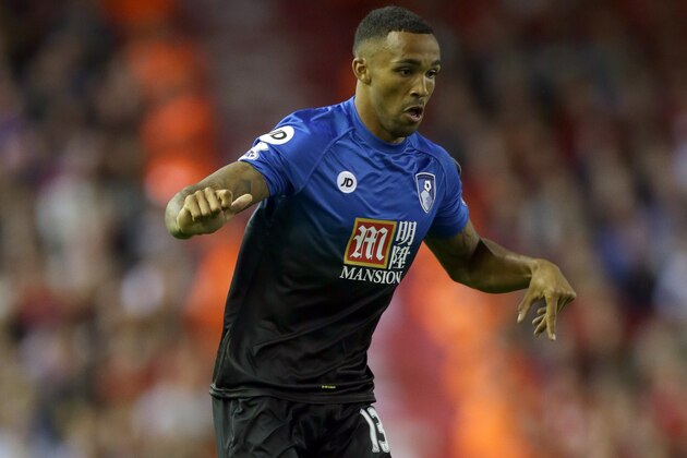 Bournemouth's Callum Wilson in action during their English Premier League soccer match against Liverpool at Anfield in Liverpool, England, Monday Aug. 17, 2015. (AP Photo/Clint Hughes)