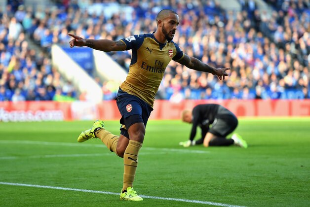 LEICESTER, ENGLAND - SEPTEMBER 26:  Theo Walcott of Arsenal celebrates scoring his team's first goal during the Barclays Premier League match between Leicester City and Arsenal at The King Power Stadium on September 26, 2015 in Leicester, United Kingdom.  (Photo by Michael Regan/Getty Images)