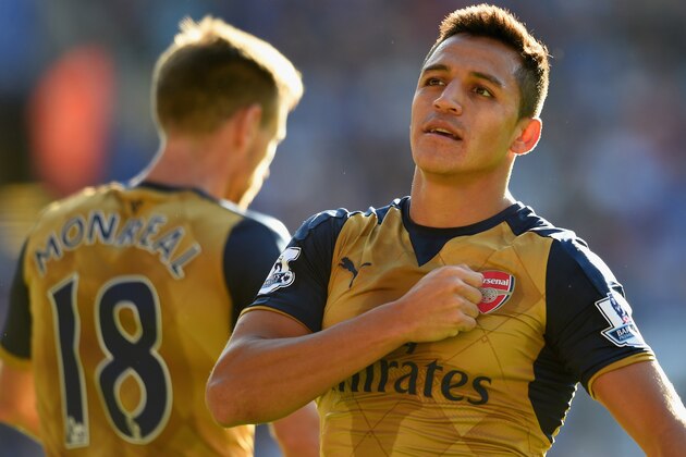 LEICESTER, ENGLAND - SEPTEMBER 26:  Alexis Sanchez of Arsenal celebrates scoring his team's fourth and his hat trick goal during the Barclays Premier League match between Leicester City and Arsenal at The King Power Stadium on September 26, 2015 in Leicester, United Kingdom.  (Photo by Ross Kinnaird/Getty Images)