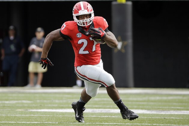 Georgia running back Nick Chubb carries the ball against Vanderbilt in the first half of an NCAA college football game Saturday, Sept. 12, 2015, in Nashville, Tenn. Chubb ran for 189 yards as Georgia won 31-14. (AP Photo/Mark Humphrey)