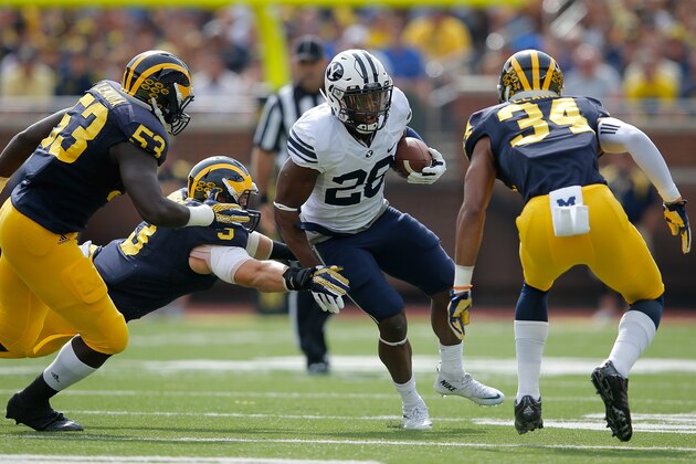ANN ARBOR, MI - SEPTEMBER 26:  Running back Adam Hine #28 of the Brigham Young Cougars carries the ball against the Michigan Wolverines at Michigan Stadium on September 26, 2015 in Ann Arbor, Michigan.  (Photo by Doug Pensinger/Getty Images)