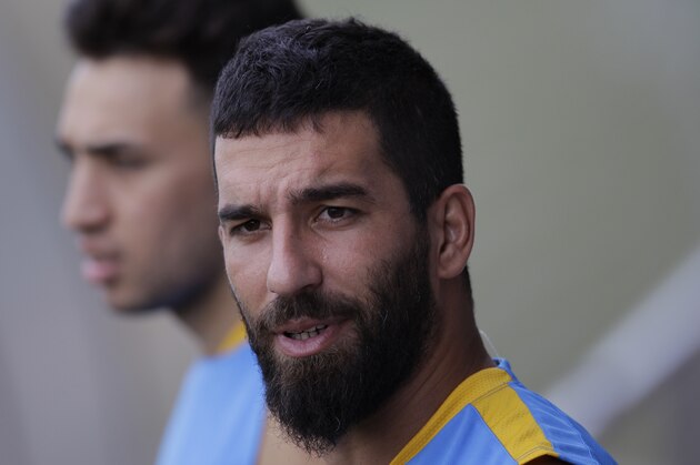 FC Barcelona's Arda Turan looks on during a training session at the Sports Center FC Barcelona Joan Gamper in the San Joan Despi, Spain, Wednesday, July 15, 2015. (AP Photo/Manu Fernandez)