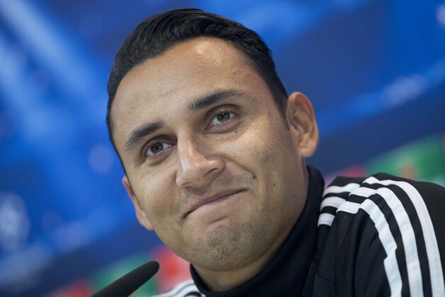 Real Madrid's goalkeeper Keylor Navas smiles during a press conference in Madrid, Spain, Monday Dec. 8, 2014. Real Madrid will play Ludogorets Tuesday in a Group B Champions League soccer match. (AP Photo/Paul White)
