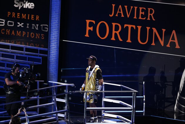 Javier Fortuna walks to the ring before his boxing bout with Bryan Vasquez, Friday, May 29, 2015, at the Barclays Center in New York. (AP Photo/Julia Weeks)