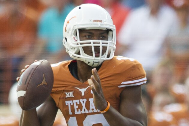 AUSTIN, TX - SEPTEMBER 26:  Jerrod Heard #13 of the Texas Longhorns drops back to pass against the Oklahoma State Cowboys during the 2nd quarter on September 26, 2015 at Darrell K Royal-Texas Memorial Stadium in Austin, Texas.  (Photo by Cooper Neill/Getty Images)
