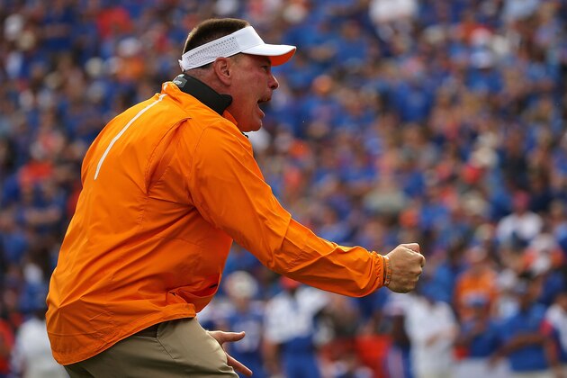 GAINESVILLE, FL - SEPTEMBER 26: Head coach Butch Jones of the Tennessee Volunteers cheers during a game against the Florida Gators at Ben Hill Griffin Stadium on September 26, 2015 in Gainesville, Florida.  (Photo by Mike Ehrmann/Getty Images)
