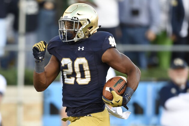 Sep 19, 2015; South Bend, IN, USA; Notre Dame Fighting Irish running back C.J. Prosise (20) carrie stye ball for a 91 yard touchdown run against the Georgia Tech Yellow Jackets at Notre Dame Stadium. Mandatory Credit: RVR Photos-USA TODAY Sports