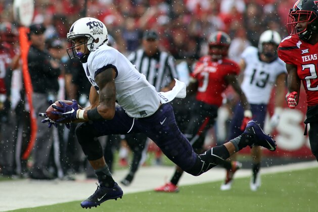 Sep 26, 2015; Lubbock, TX, USA; Texas Christian University Horned Frogs wide receiver Josh Doctson (9) catches a ball against the Texas Tech Red Raiders in the first half at Jones AT&T Stadium. Mandatory Credit: Michael C. Johnson-USA TODAY Sports
