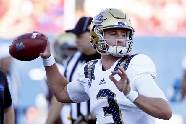 UCLA quarterback Josh Rosen warms up before an NCAA college football game against Arizona, Saturday, Sept. 26, 2015, in Tucson, Ariz. (AP Photo/Rick Scuteri)
