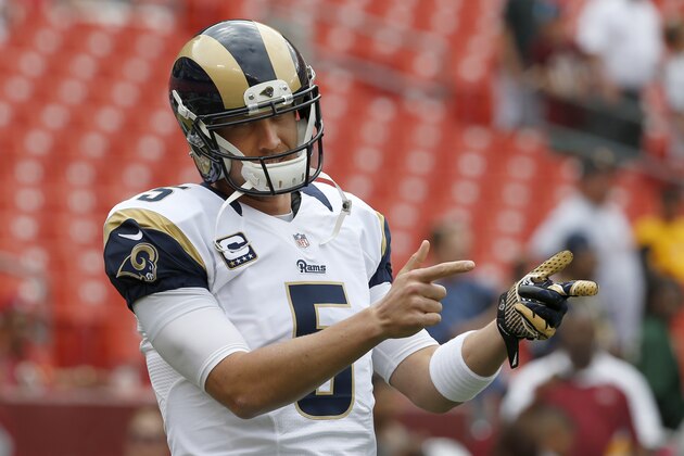 St. Louis Rams quarterback Nick Foles (5) warms up before an NFL football game against the Washington Redskins in Landover, Md., Sunday, Sept. 20, 2015. (AP Photo/Alex Brandon)
