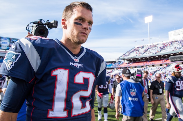 ORCHARD PARK, NY - SEPTEMBER 20:  Tom Brady #12 of the New England Patriots walks off the field after the win against the Buffalo Bills on September 20, 2015 at Ralph Wilson Stadium in Orchard Park, New York.  New England defeats Buffalo 40-32.  (Photo by Brett Carlsen/Getty Images)