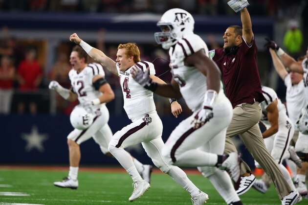 ARLINGTON, TX - SEPTEMBER 26:  The Texas A&M Aggies celebrate their overtime win against the Arkansas Razorbacks during the Southwest Classic at AT&T Stadium on September 26, 2015 in Arlington, Texas.  (Photo by Ronald Martinez/Getty Images)