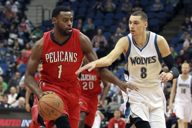 New Orleans Pelicans Tyreke Evans (1) dribbles the ball against Minnesota Timberwolves Zach LaVine (8) in the half of an NBA basketball game Monday, April 13, 2015, in Minneapolis. (AP Photo/Andy Clayton-King) New Orleans Pelicans Tyreke Evans (1) dribbles the ball against Minnesota Timberwolves Zach LaVine (8) in the half of an NBA basketball game Monday, April 13, 2015, in Minneapolis. (AP Photo/Andy Clayton-King)