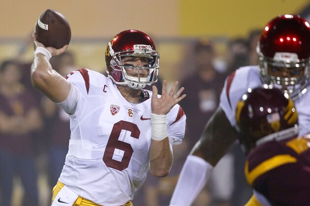 Southern California's Cody Kessler (6) throws a touchdown pass during the first half of an NCAA college football game against Arizona State on Saturday, Sept. 26, 2015, in Tempe, Ariz. (AP Photo/Ross D. Franklin)