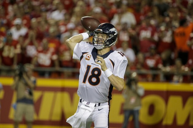 Denver Broncos quarterback Peyton Manning (18) throws during the first half of an NFL football game against the Kansas City Chiefs in Kansas City, Mo., Thursday, Sept. 17, 2015. (AP Photo/Charlie Riedel)