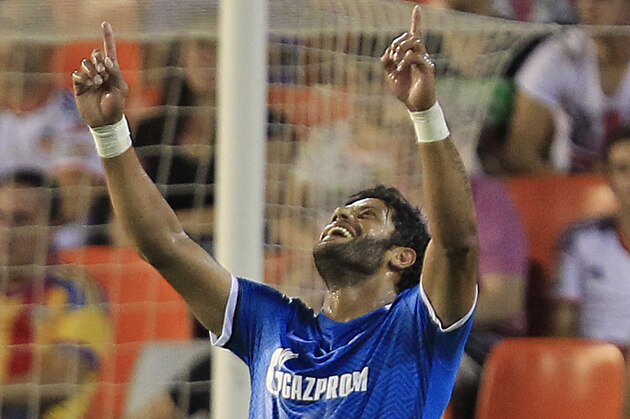 Zenit's Hulk celebrates scoring against Valencia, during a Group H Champions League soccer match between Valencia and Zenit Saint Petersburg, at the Mestalla stadium in Valencia, Spain, Wednesday,  Sept. 16, 2015. (AP Photo/Alberto Saiz)