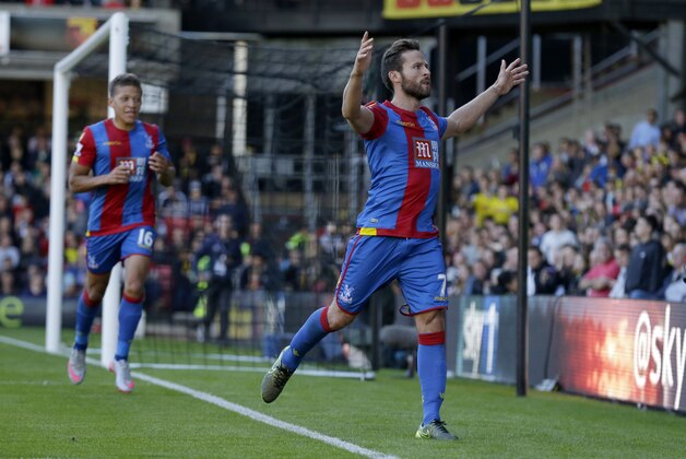 Crystal Palace's Yohan Cabaye celebrates scoring his side's first goal from a penalty during the English Premier League soccer match between Watford and Crystal Palace at Vicarage Road stadium in London, Sunday, Sept. 27, 2015.  (AP Photo/Matt Dunham)