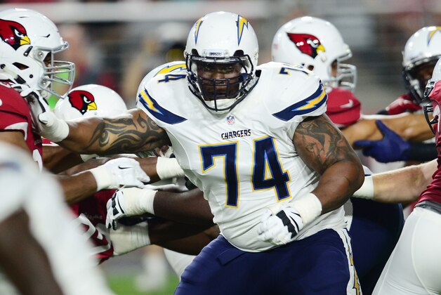Aug 22, 2015; Glendale, AZ, USA; San Diego Chargers tackle Orlando Franklin (74) blocks against the Arizona Cardinals during the first half at University of Phoenix Stadium. Mandatory Credit: Joe Camporeale-USA TODAY Sports