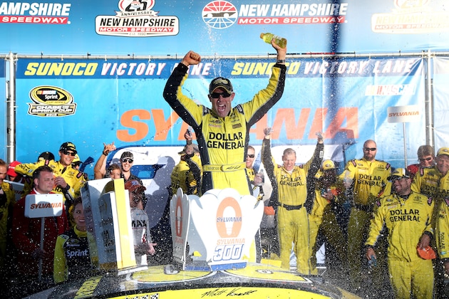 LOUDON, NH - SEPTEMBER 27:  Matt Kenseth, driver of the #20 Dollar General Toyota, celebrates in Victory Lane after winning the NASCAR Sprint Cup Series SYLVANIA 300 at New Hampshire Motor Speedway on September 27, 2015 in Loudon, New Hampshire.  (Photo by Sean Gardner/Getty Images)