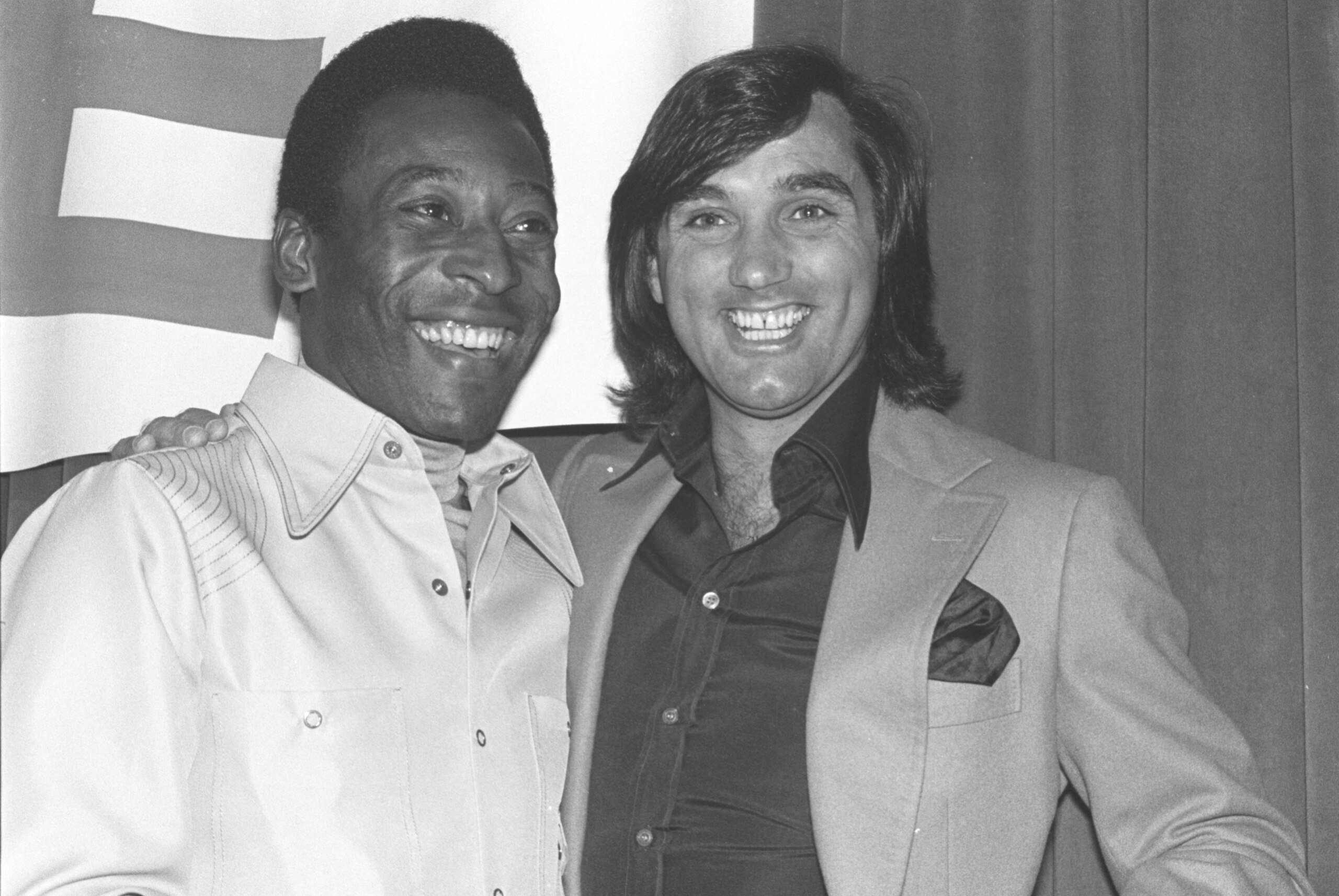 ** FILE ** Former soccer stars  Manchester United and Northern Ireland starGeorge Best, right, and Brazil's Pele, smile during an awards luncheon for Pele in Los Angeles in this April 1978 file photo. Best, the dazzling soccer icon of the 1960s and 70s who reveled in a hard-drinking playboy lifestyle, died Friday Nov. 25, 2005 after decades of alcohol abuse, hospital officials said. He was 59.(AP Photo)