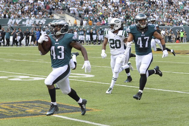 Philadelphia Eagles running back Darren Sproles (43) returns a punt by the New York Jets for a touchdown during the second quarter of an NFL football game, Sunday, Sept. 27, 2015, in East Rutherford, N.J. (AP Photo/Bill Kostroun)