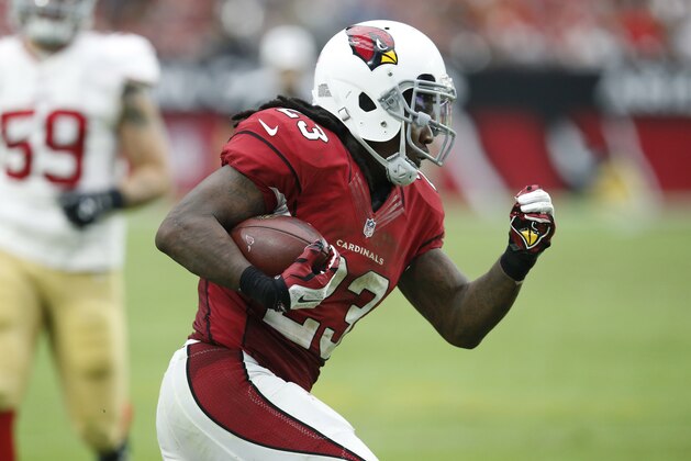 Arizona Cardinals running back Chris Johnson (23) runs against the San Francisco 49ers during the second half of an NFL football game, Sunday, Sept. 27, 2015, in Glendale, Ariz.  (AP Photo/Rick Scuteri)