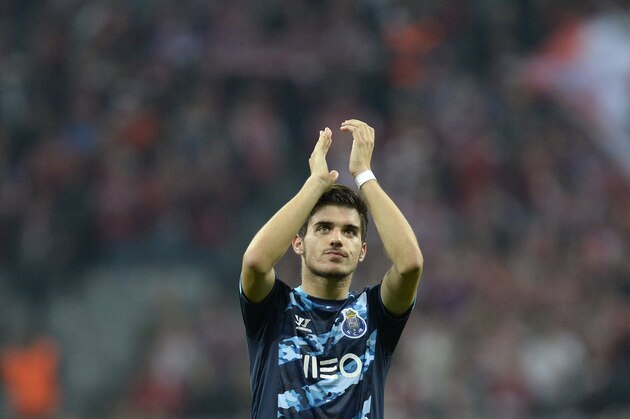 Porto's midfielder Ruben Neves reacts after the UEFA Champions League second-leg quarter-final football match Bayern Munich v FC Porto in Munich, southern Germany on April 21, 2015. AFP PHOTO / CHRISTOF STACHE        (Photo credit should read CHRISTOF STACHE/AFP/Getty Images)