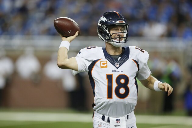 Denver Broncos quarterback Peyton Manning (18) looks downfield during the second half of an NFL football game against the Detroit Lions, Sunday, Sept. 27, 2015, in Detroit. (AP Photo/Duane Burleson)