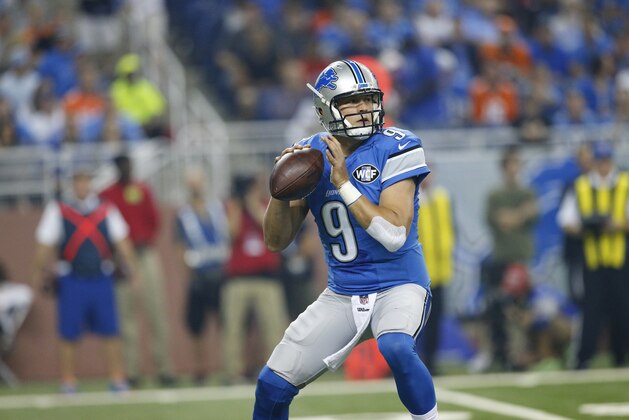 Detroit Lions quarterback Matthew Stafford looks to pass during the first half of an NFL football game against the Denver Broncos, Sunday, Sept. 27, 2015, in Detroit. (AP Photo/Rick Osentoski)