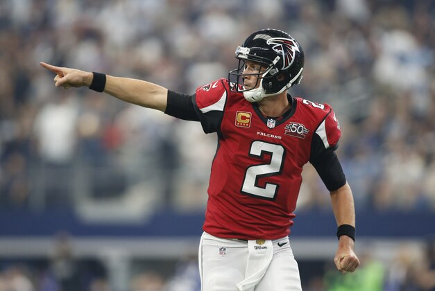 Sep 27, 2015; Arlington, TX, USA; Atlanta Falcons quarterback Matt Ryan (2) celebrates throwing a touchdown pass in the third quarter against the Dallas Cowboys at AT&T Stadium. Atlanta won 39-28. Mandatory Credit: Tim Heitman-USA TODAY Sports
