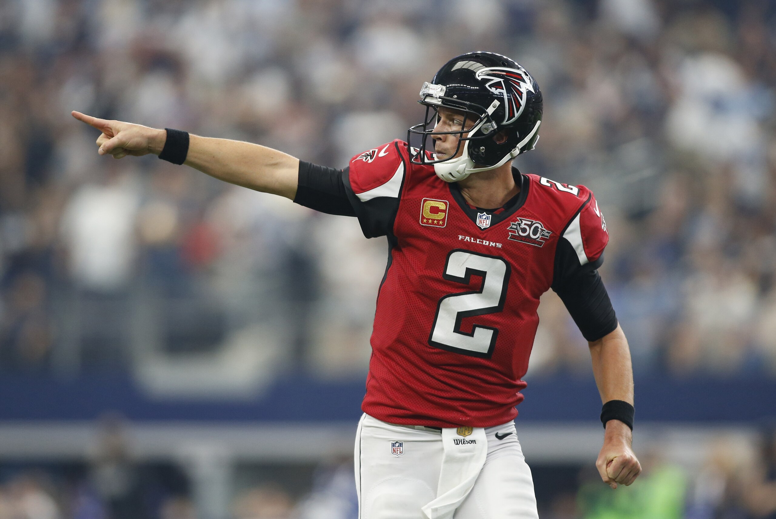 Sep 27, 2015; Arlington, TX, USA; Atlanta Falcons quarterback Matt Ryan (2) celebrates throwing a touchdown pass in the third quarter against the Dallas Cowboys at AT&T Stadium. Atlanta won 39-28. Mandatory Credit: Tim Heitman-USA TODAY Sports