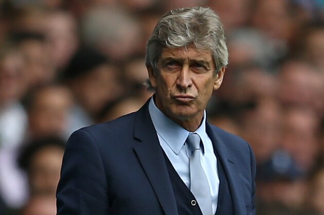 Manchester City's Chilean manager Manuel Pellegrini reacts during the English Premier League football match between Tottenham Hotspur and Manchester City at White Hart Lane in north London on September 26, 2015. AFP PHOTO / JUSTIN TALLIS

RESTRICTED TO EDITORIAL USE. No use with unauthorized audio, video, data, fixture lists, club/league logos or 'live' services. Online in-match use limited to 75 images, no video emulation. No use in betting, games or single club/league/player publications.        (Photo credit should read JUSTIN TALLIS/AFP/Getty Images)