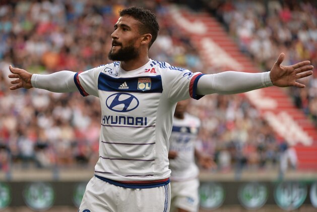 Lyon's French midfielder Nabil Fekir celebrates after scoring a goal during the French L1 football match between Caen (SM Caen) and Olympique Lyonnais, on August 29, 2015, at the Michel d'Ornano stadium, in Caen, western France. AFP PHOTO/ JEAN-FRANCOIS MONIER        (Photo credit should read JEAN-FRANCOIS MONIER/AFP/Getty Images)