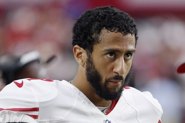 San Francisco 49ers' Colin Kaepernick (7) looks up at the scoreboard from the bench during the second half of an NFL football game against the Arizona Cardinals Sunday, Sept. 27, 2015, in Glendale, Ariz. The Cardinals defeated the 49ers 47-7. (AP Photo/Ross D. Franklin) San Francisco 49ers' Colin Kaepernick (7) looks up at the scoreboard from the bench during the second half of an NFL football game against the Arizona Cardinals Sunday, Sept. 27, 2015, in Glendale, Ariz. The Cardinals defeated the 49ers 47-7. (AP Photo/Ross D. Franklin)